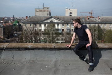 man posing in selvedge  jeans