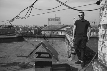 man posing in selvedge  jeans