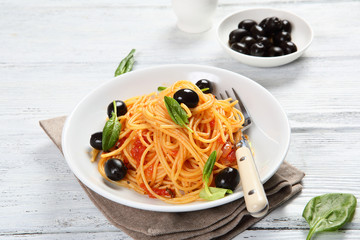Pasta with olives and basil