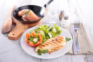 chicken breast and salad