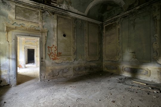 old abandoned frescoed room