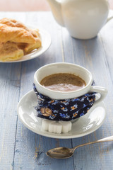 coffee cup black wooden board brown white jug milk croissants
