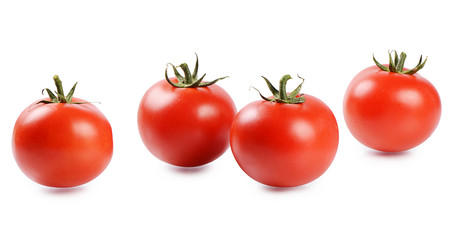 Red fresh tomatoes isolated on white