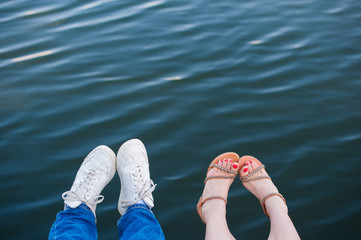 Naklejka premium Fashionable cool couple, legs, lifestyle - concept