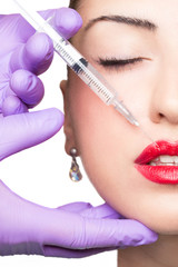 Woman gets cosmetic injection. Beauty Treatment