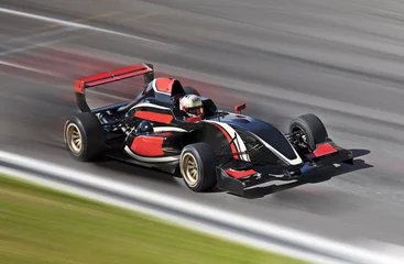 Stickers pour porte Sport automobile Course de voitures de course F1 sur une piste avec flou de mouvement