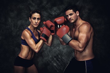 Naklejka na ściany i meble Composite image of boxing couple