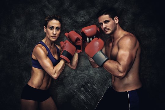 Composite image of boxing couple