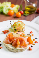 Creative composition delicious fresh smoked sliced salmon with
