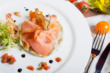 Creative composition delicious fresh smoked sliced salmon with