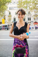 Young girl holding a water bottle