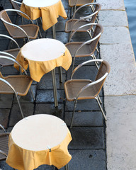 Venice, yellow chairs and table