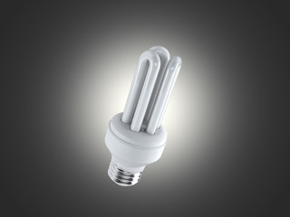 Energy saving fluorescent lightbulb on a dark bakground