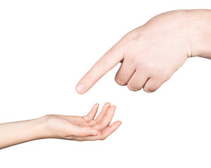 small child's hand reaches for the big hand man 