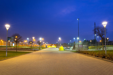 Fototapeta premium Park pathway in Gdansk at night, Poland