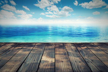 Fototapeta na wymiar wooden paving and the beach.