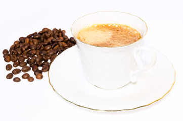 Coffee cup and beans on a white background.