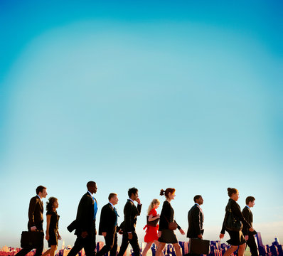 Multiethnic Businesspersons Walking Rush Hour City Concept