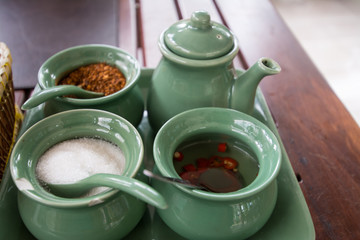 Thai  noodle seasonings on table