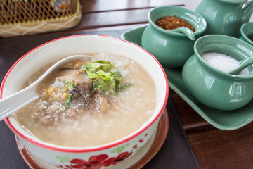 Asian style breakfast soft boiled rice, rice soup Thailand food