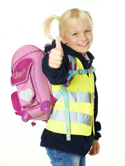 Cute child with reflective vest showing thumbs up