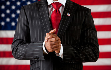 Politician: Man with Hands Clasped - obrazy, fototapety, plakaty