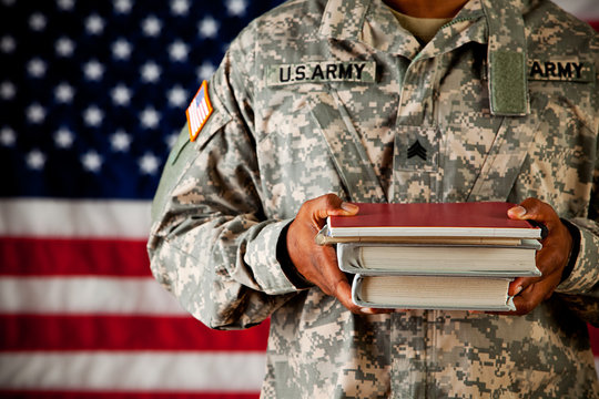Soldier: Student Holding Stack of School Books