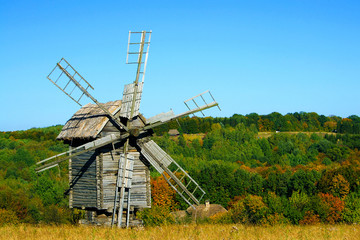 Fototapeta premium Old wooden windmills at autumn season