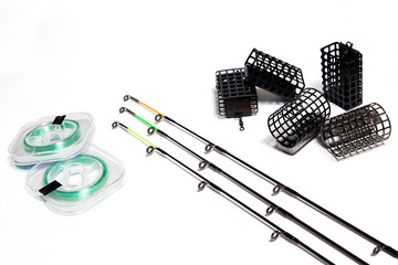 Fishing accessories on white background.