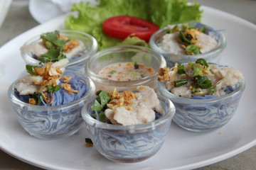 Crake noodles  with steamed pork and coconut milk.