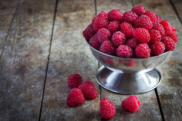 raspberries in a metal bowl