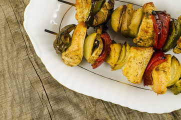Grilled shashlik on wooden table