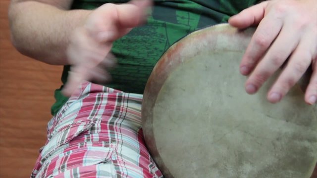 man playing darbuka  percussion close up