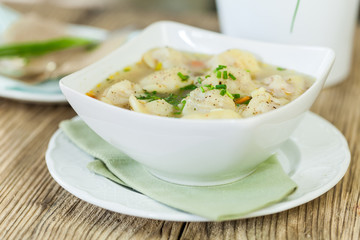 Dish of savory pork tortellini in broth pelmeni russian