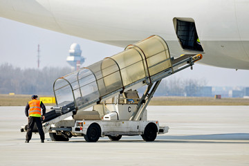 Loading luggage to airplane © Tomasz Warszewski