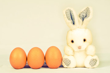 Naklejka na ściany i meble easter bunny with three eggs
