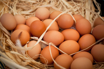 Basket of organic eggs in a rural farmers market