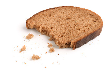 Fototapeta na wymiar Slice of rye bread and breadcrumbs