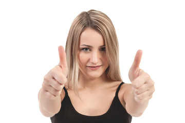 Fototapeta premium Close-up of a young woman showing thumbs up - Stock