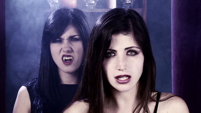 Portrait of angry female vampires looking camera