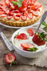 cream with fresh strawberries