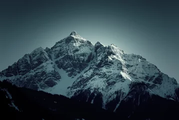 Zelfklevend Fotobehang Snow covered peak in Alps © Zsolt Biczó