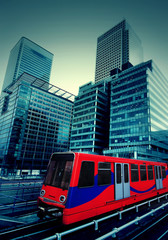 Fototapeta premium London, Canary Wharf with train