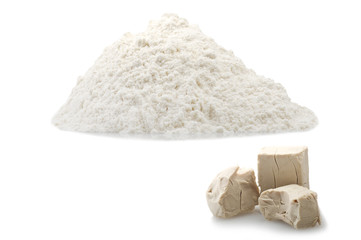Flour and Yeast cubes close up on the white