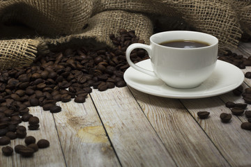 Cup of coffee and coffee beans