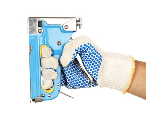 Staple gun in male hand isolated on white