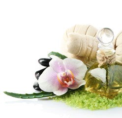 Spa treatments with orchid flower isolated on white