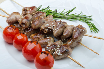Grilled chicken hearts barbecue