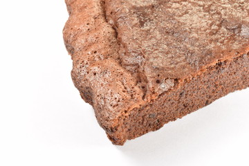  Sweet and tasty chocolate cake on a white background.