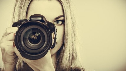 Photographer girl shooting images